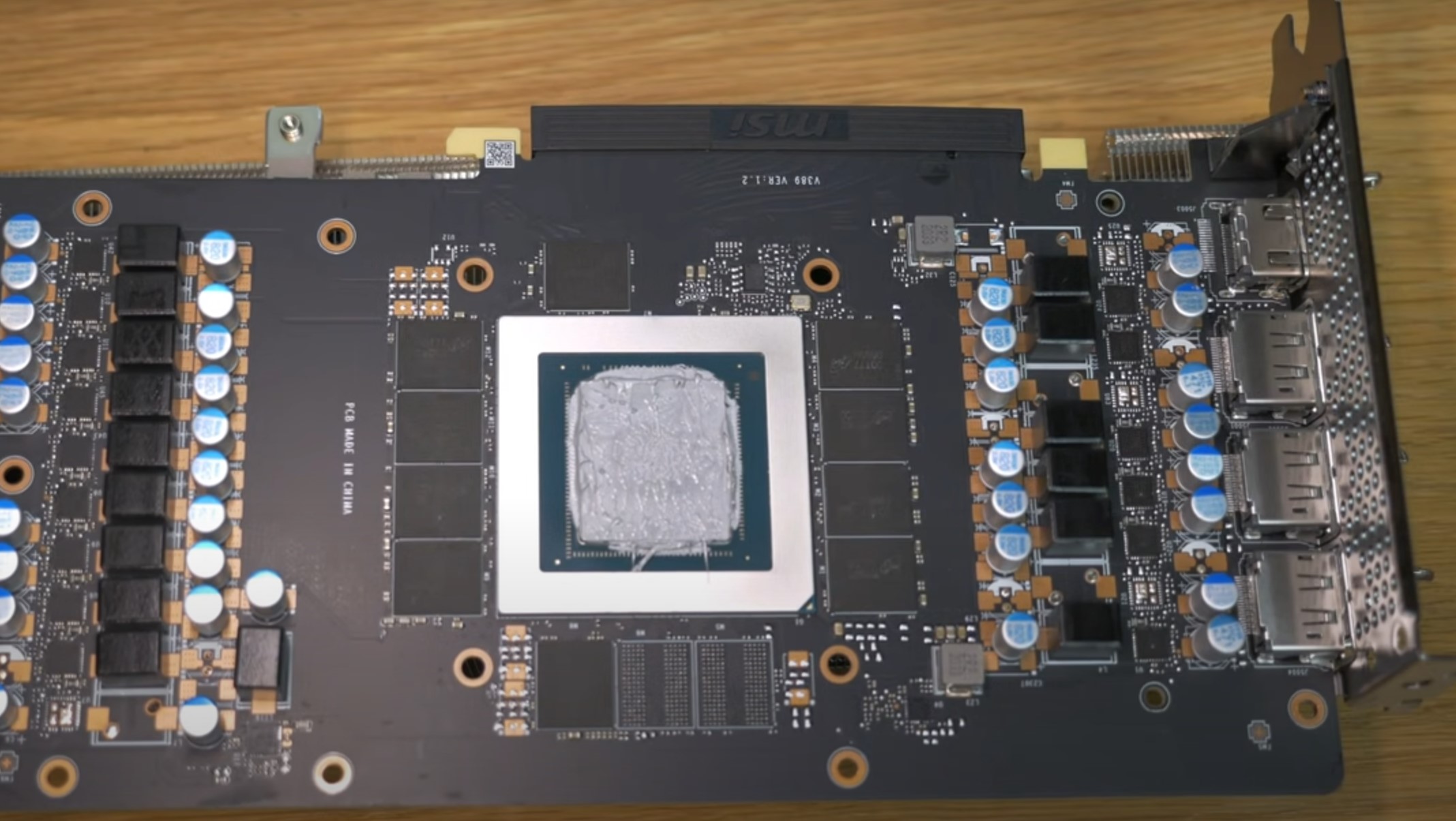 GPU AIO mod · step 2 — NZXT bracket fitted to the GPU PCB