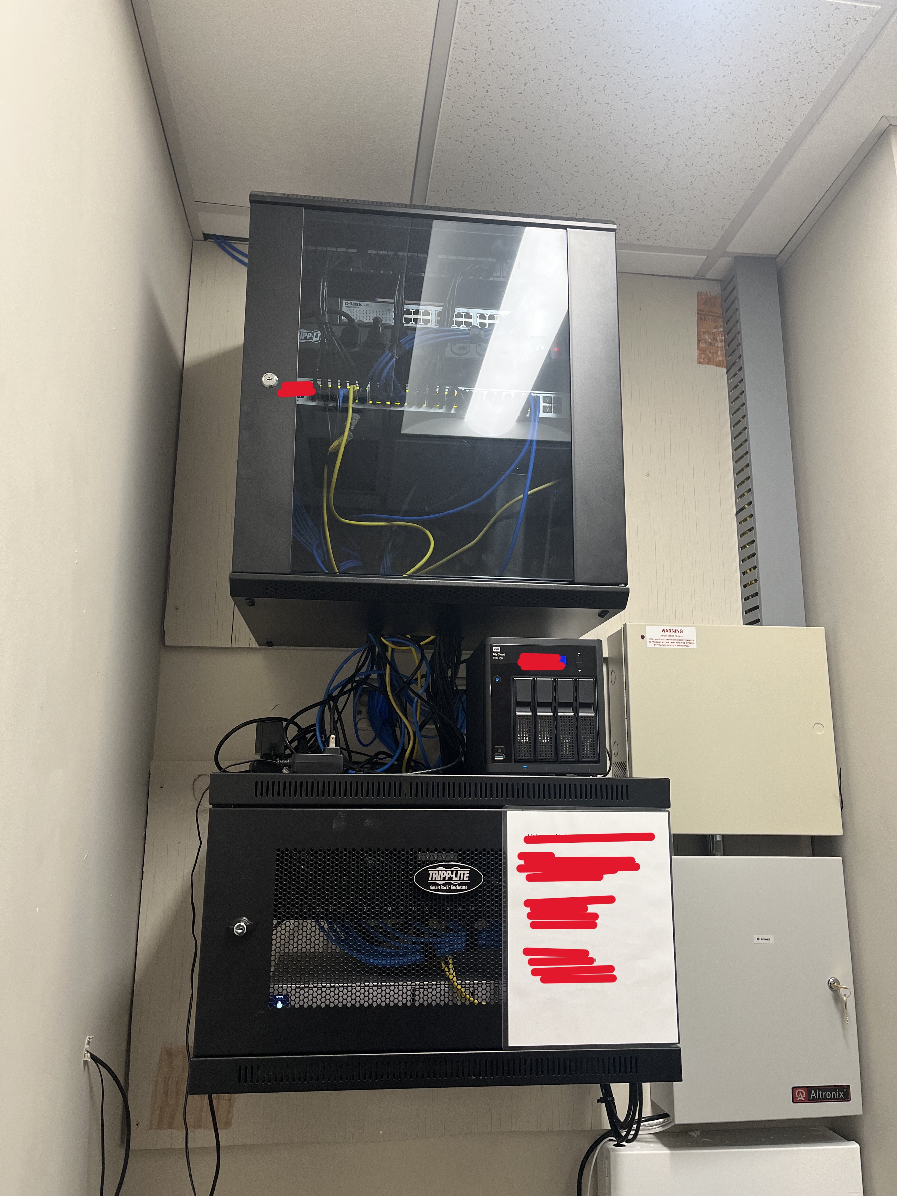 Networking closet · before — legacy wiring, limited documentation